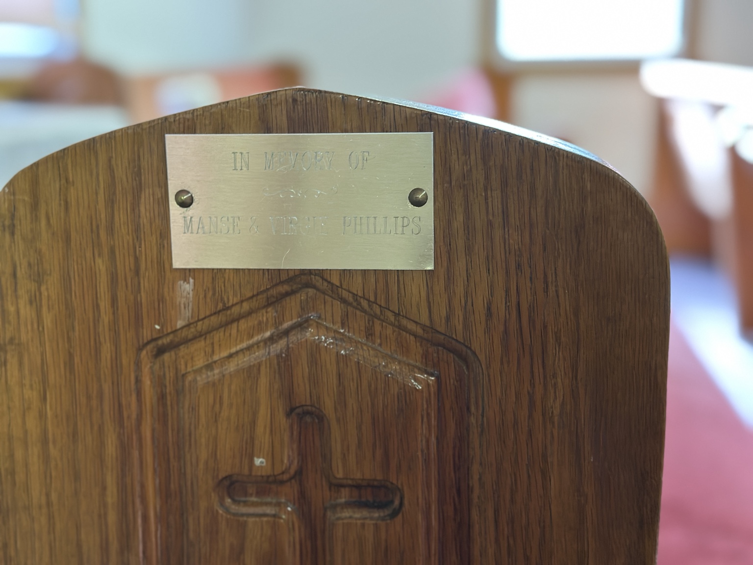 Memorial plaque reading In memory of Manse & Virgie Phillips