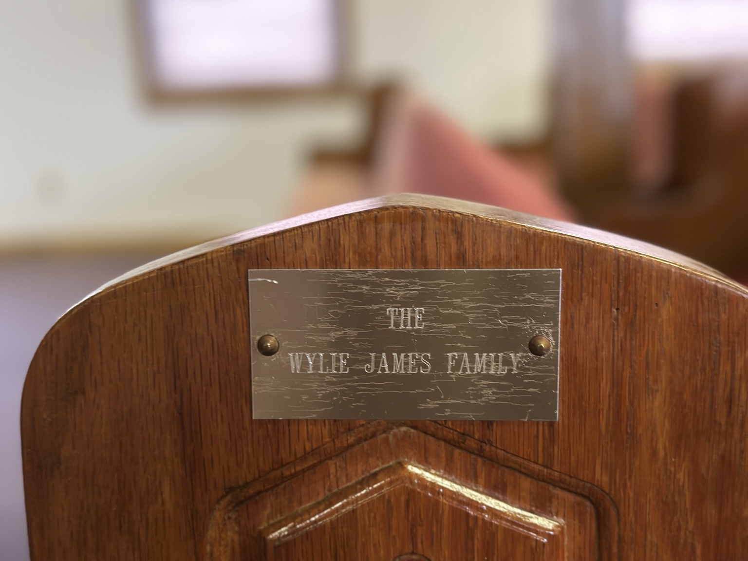 Memorial plaque reading The Willie James Family
